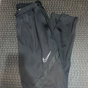 Dark gray Nike athletic pants